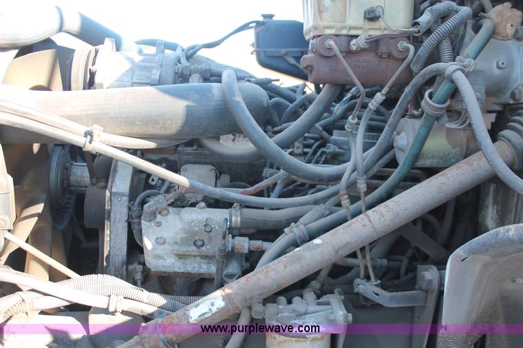 image for item H8289 2000 Freightliner FL60 ambulance