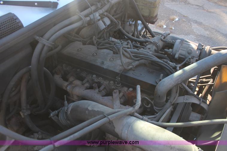 image for item H8289 2000 Freightliner FL60 ambulance