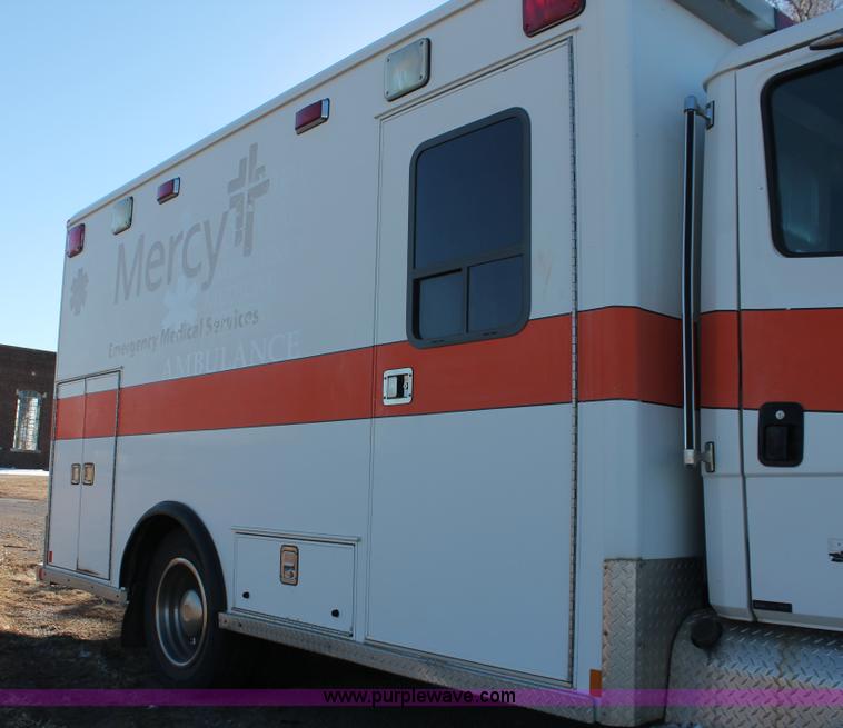 image for item H8289 2000 Freightliner FL60 ambulance