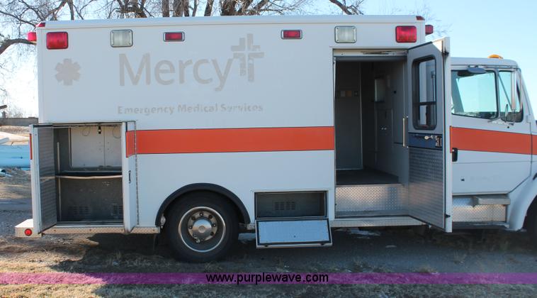 image for item H8289 2000 Freightliner FL60 ambulance