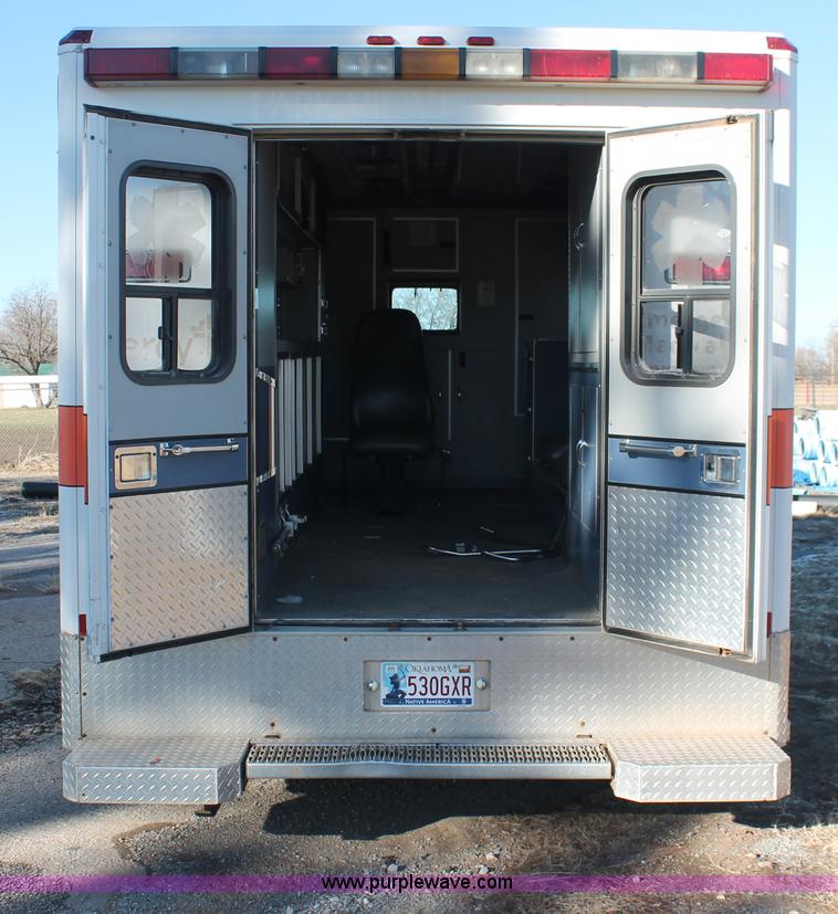 image for item H8289 2000 Freightliner FL60 ambulance