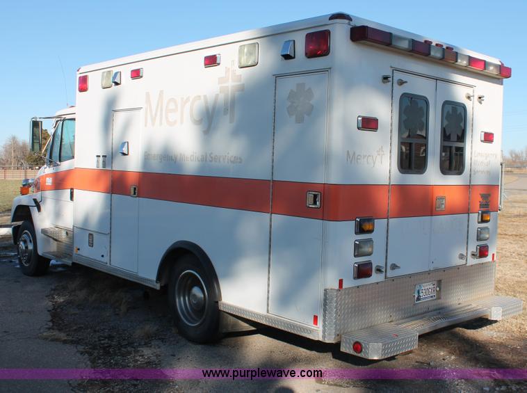 image for item H8289 2000 Freightliner FL60 ambulance