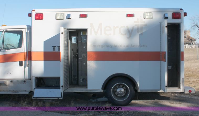 image for item H8289 2000 Freightliner FL60 ambulance