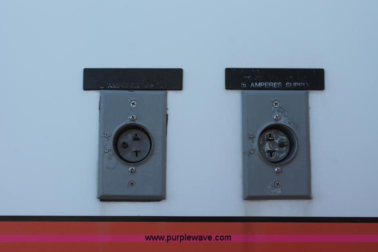 image for item H8289 2000 Freightliner FL60 ambulance