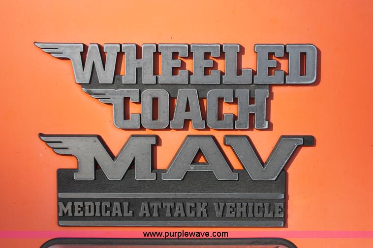 image for item H8289 2000 Freightliner FL60 ambulance