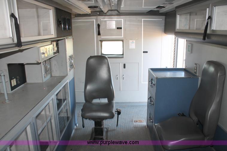 image for item H8289 2000 Freightliner FL60 ambulance