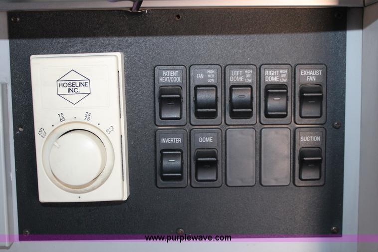 image for item H8289 2000 Freightliner FL60 ambulance