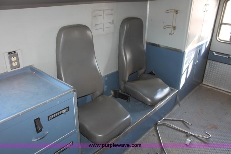 image for item H8289 2000 Freightliner FL60 ambulance