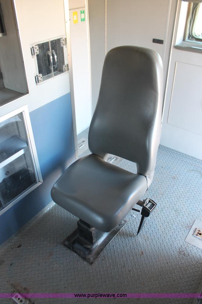 image for item H8289 2000 Freightliner FL60 ambulance