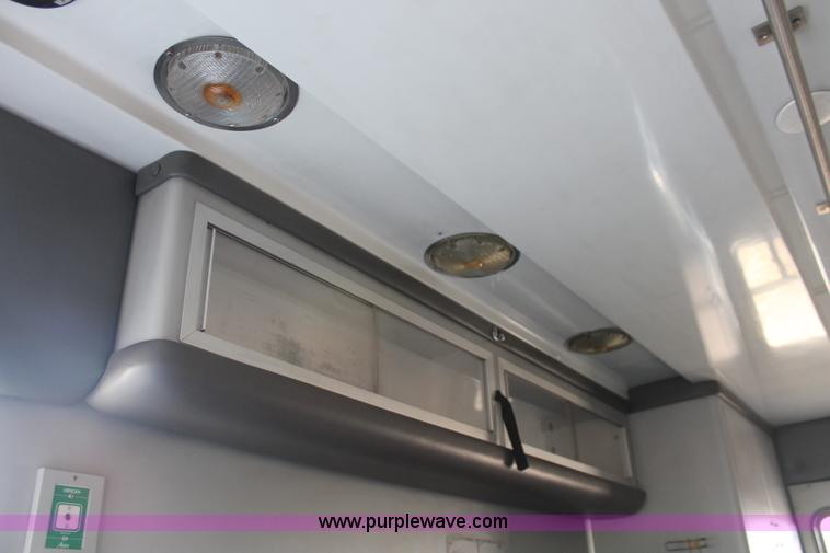 image for item H8289 2000 Freightliner FL60 ambulance