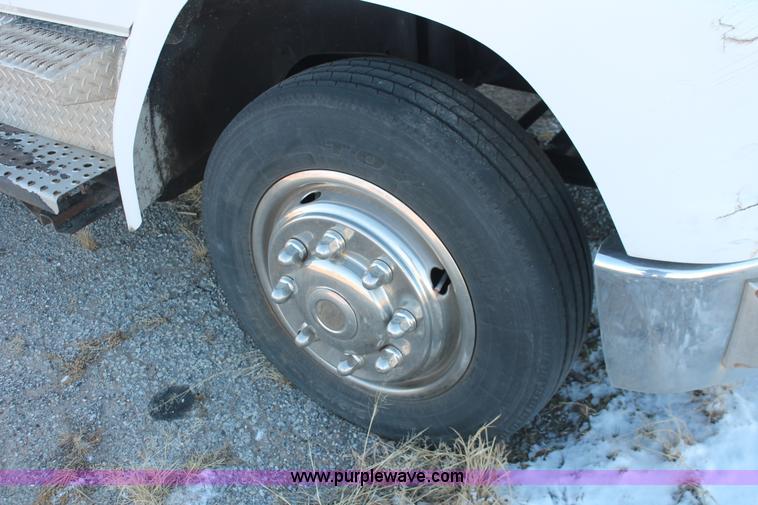 image for item H8289 2000 Freightliner FL60 ambulance