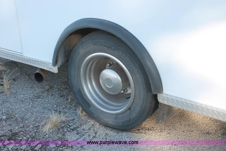 image for item H8289 2000 Freightliner FL60 ambulance