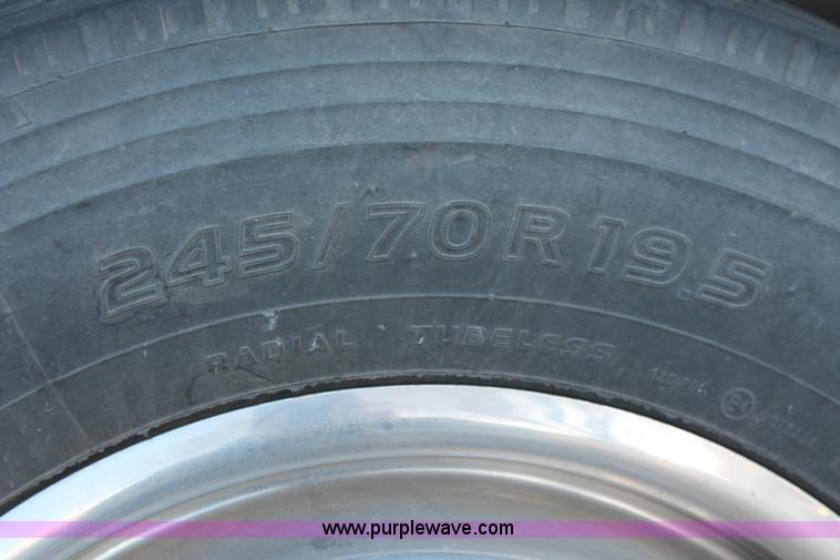 image for item H8289 2000 Freightliner FL60 ambulance