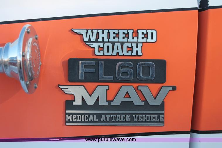 image for item H8289 2000 Freightliner FL60 ambulance