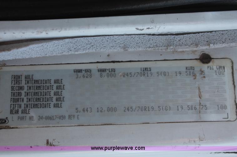 image for item H8289 2000 Freightliner FL60 ambulance