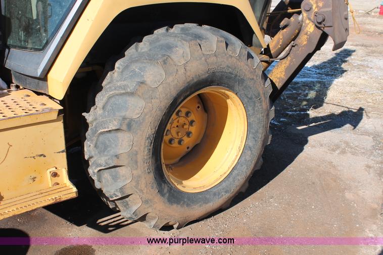 image for item H8297 1994 John Deere 310D backhoe