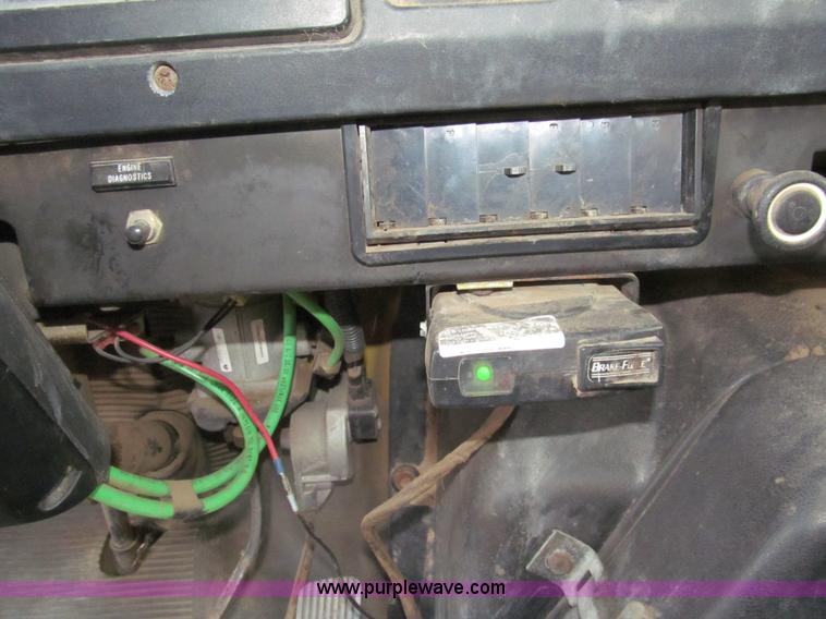 image for item I7160 1996 International 4700 flatbed truck