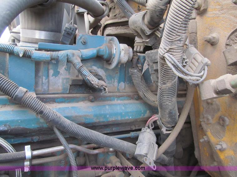 image for item I7160 1996 International 4700 flatbed truck