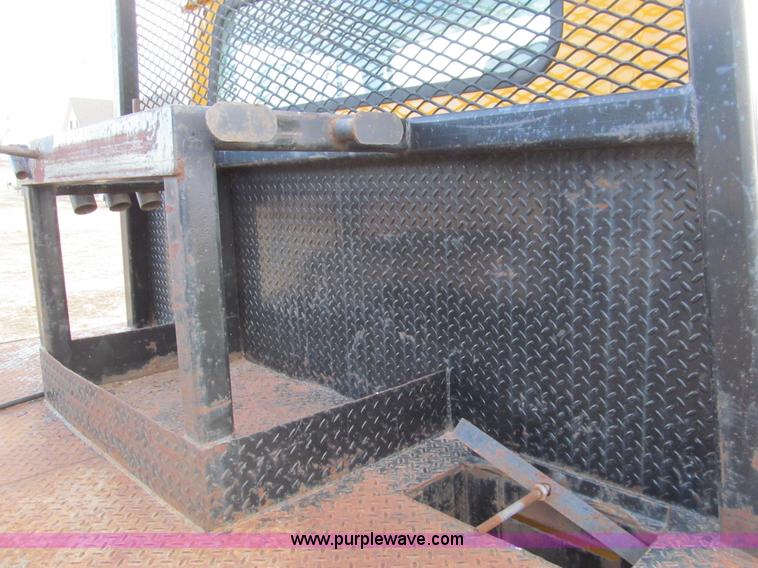 image for item I7160 1996 International 4700 flatbed truck