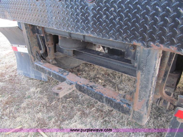 image for item I7160 1996 International 4700 flatbed truck