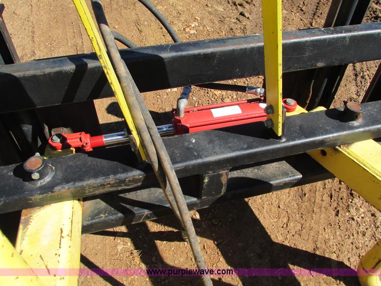 image for item AC9937 Wrapped bale grapple skid steer attachment