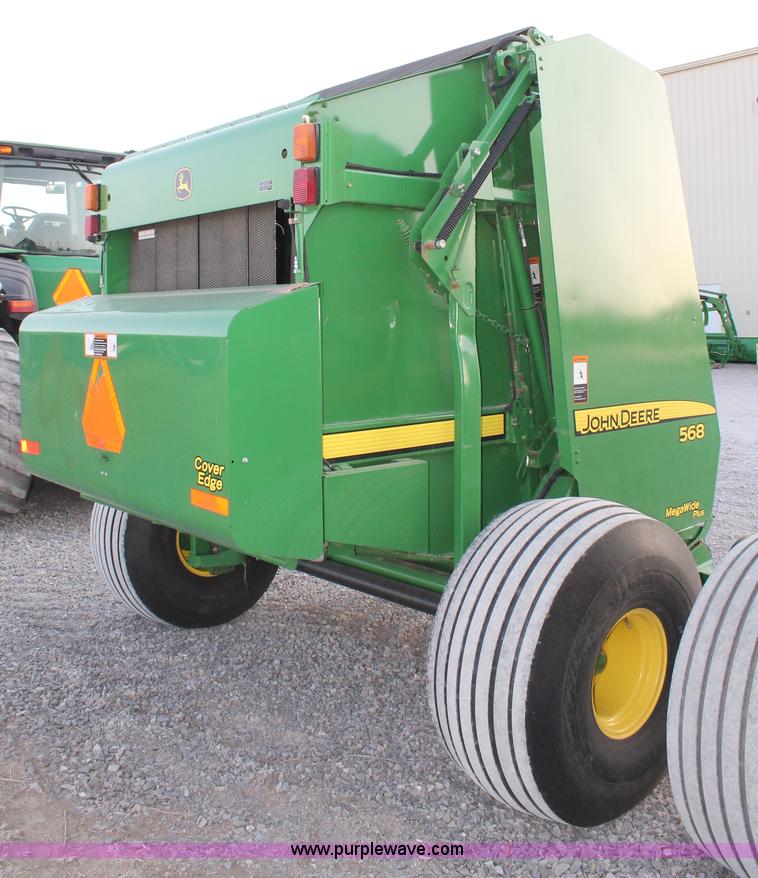 image for item C3776 2011 John Deere 568 round baler