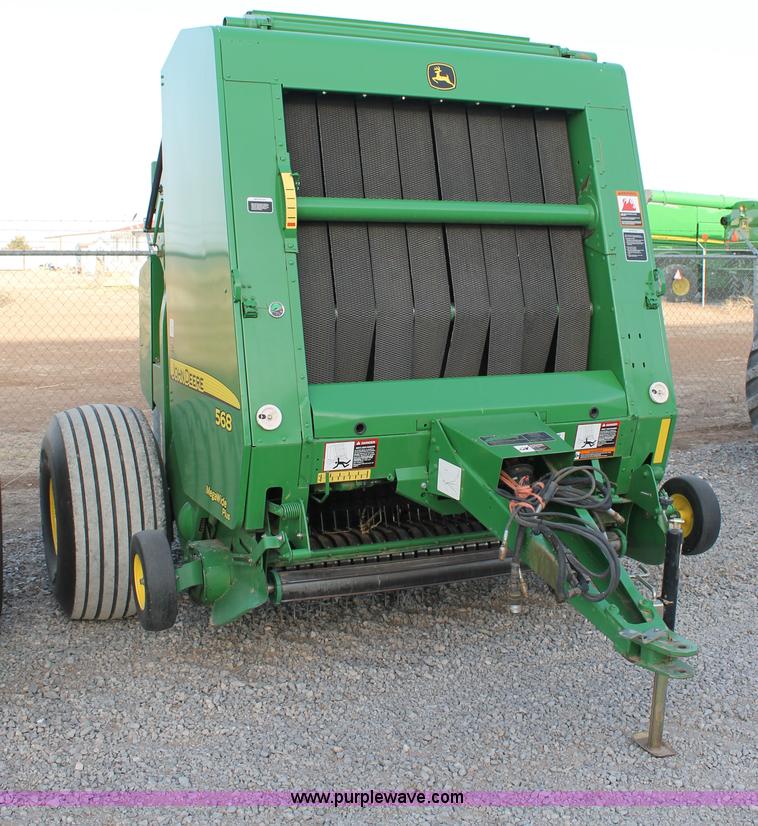 image for item C3776 2011 John Deere 568 round baler