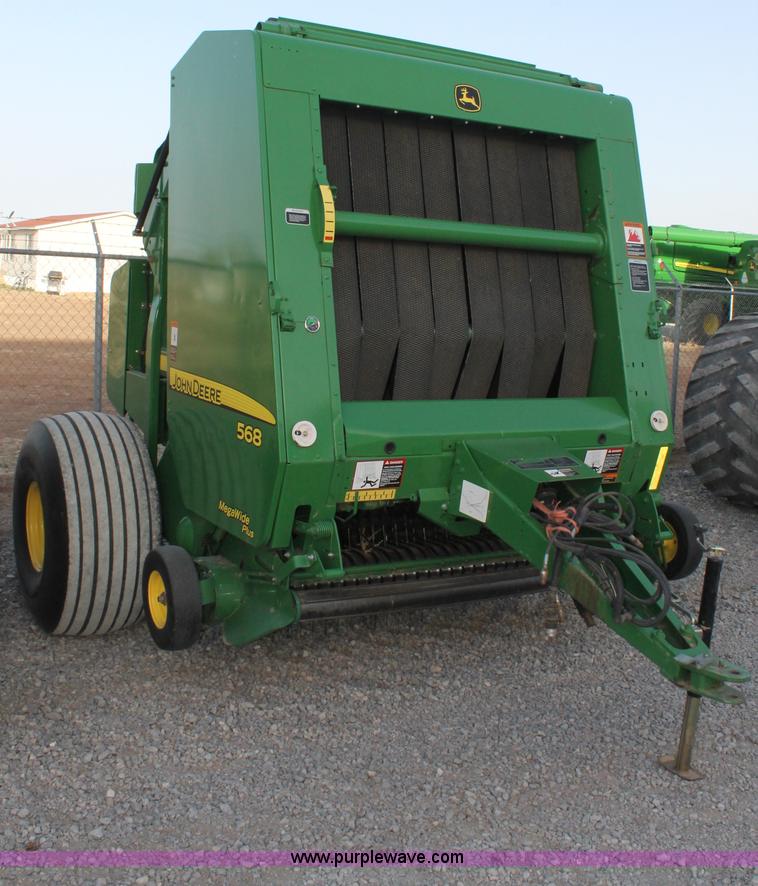 image for item C3776 2011 John Deere 568 round baler
