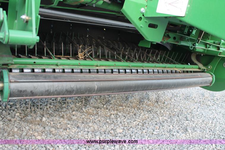 image for item C3776 2011 John Deere 568 round baler