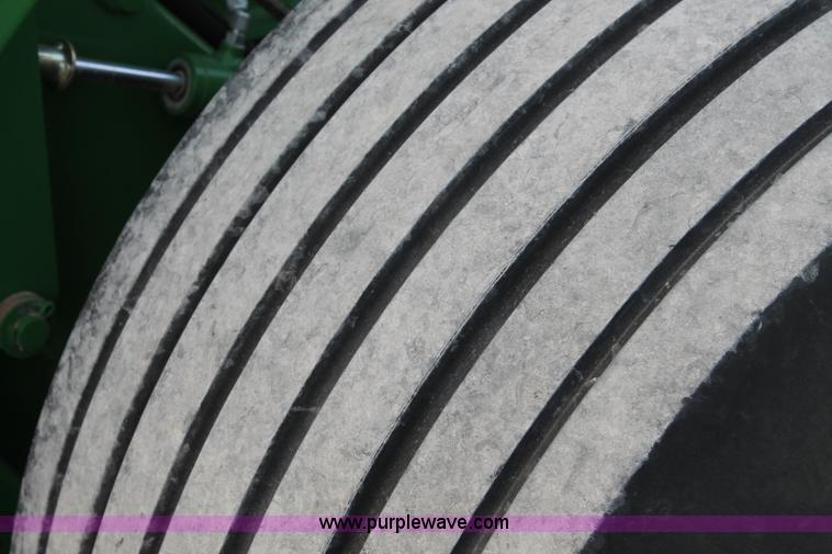 image for item C3776 2011 John Deere 568 round baler