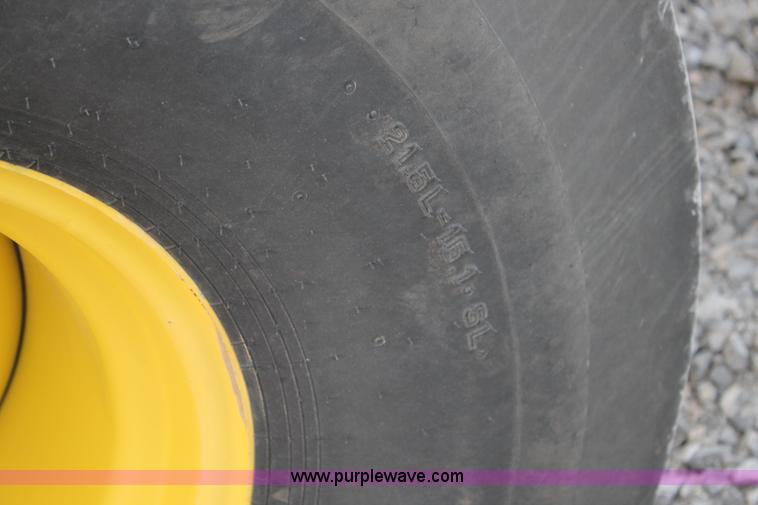 image for item C3776 2011 John Deere 568 round baler