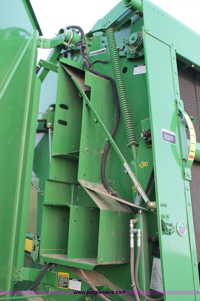 image for item C3776 2011 John Deere 568 round baler