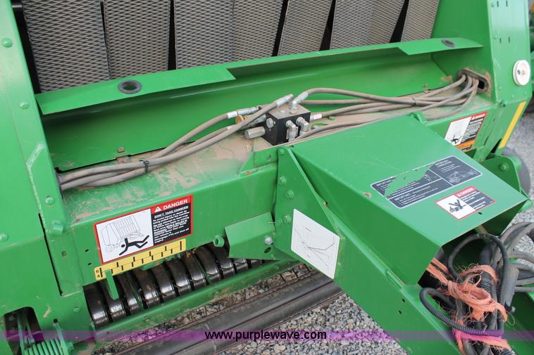 image for item C3776 2011 John Deere 568 round baler