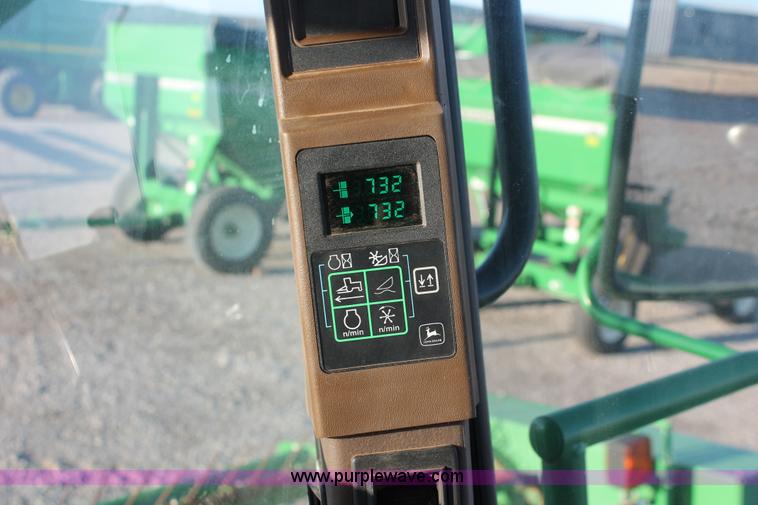 image for item H5749 2006 John Deere 4895 self-propelled swather