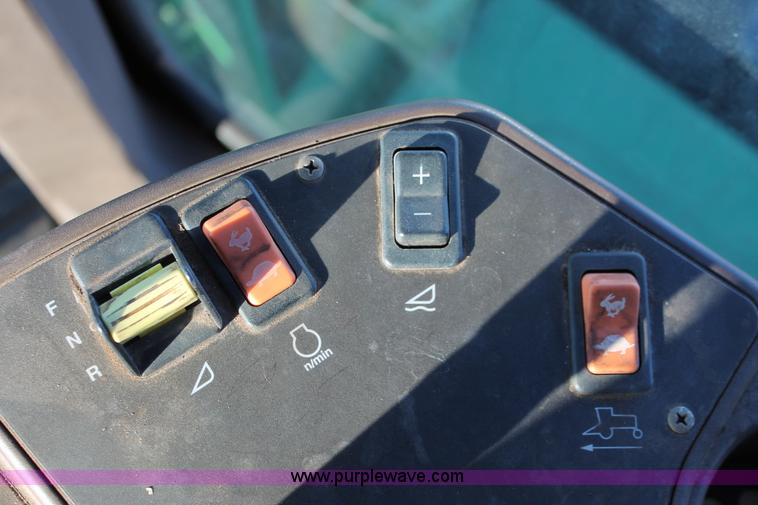 image for item H5749 2006 John Deere 4895 self-propelled swather