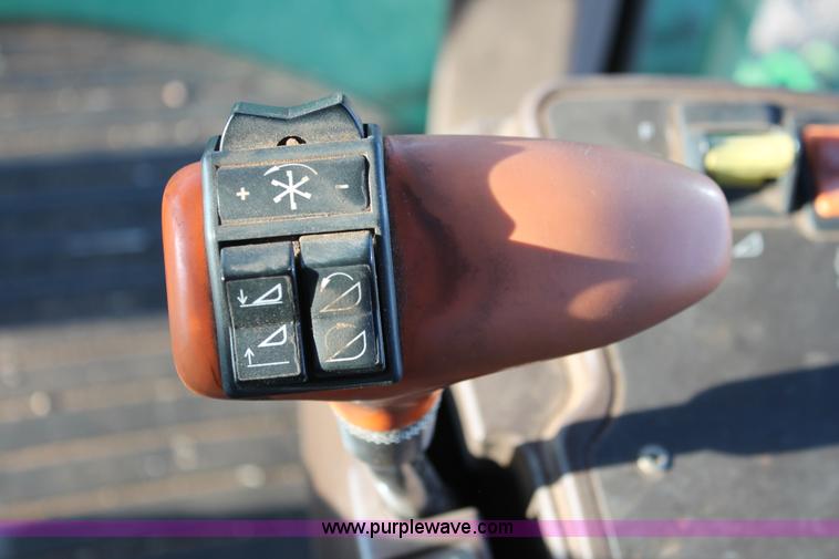 image for item H5749 2006 John Deere 4895 self-propelled swather