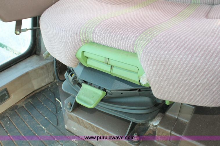 image for item H5749 2006 John Deere 4895 self-propelled swather