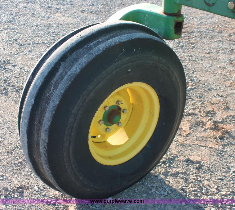 image for item H5749 2006 John Deere 4895 self-propelled swather