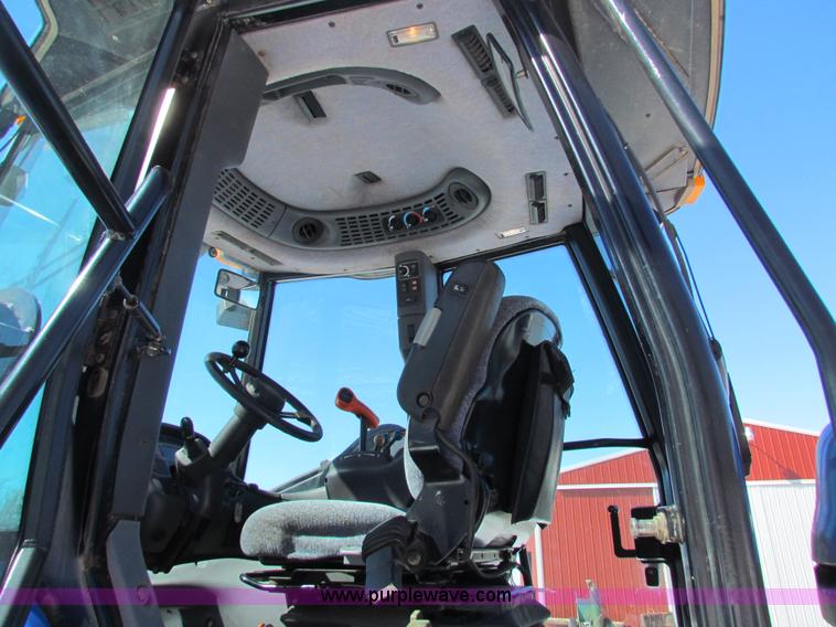 image for item I7489 2006 New Holland TV145 MFWD Bi-directional tractor