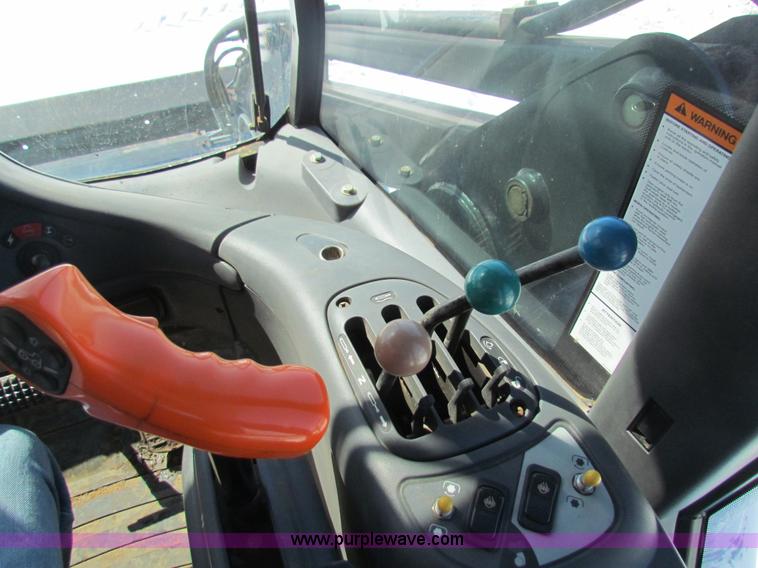 image for item I7489 2006 New Holland TV145 MFWD Bi-directional tractor