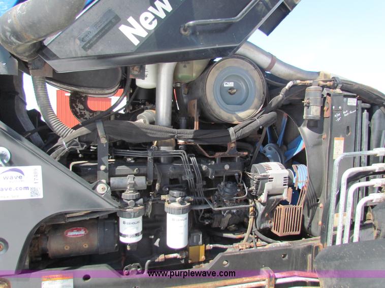 image for item I7489 2006 New Holland TV145 MFWD Bi-directional tractor