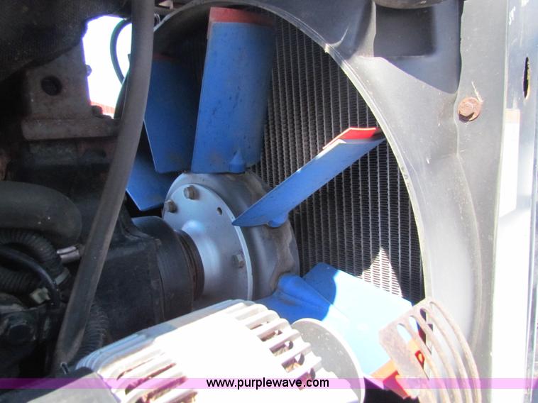 image for item I7489 2006 New Holland TV145 MFWD Bi-directional tractor