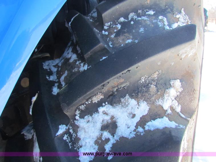 image for item I7489 2006 New Holland TV145 MFWD Bi-directional tractor