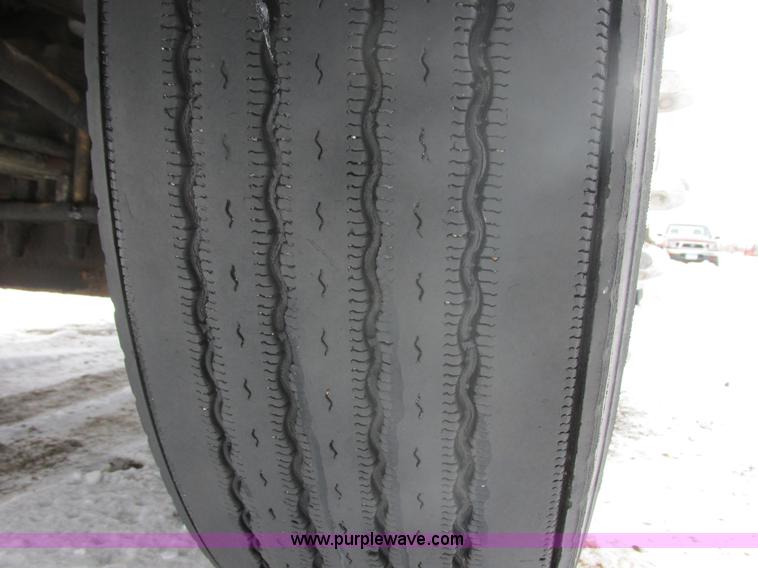 image for item E5324 1993 Peterbilt 375 utility truck