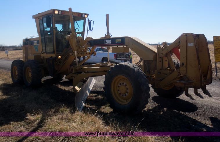 image for item F6836 1999 Caterpillar 120H articulated motor grader