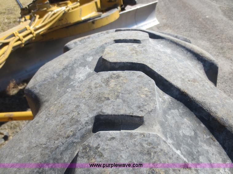 image for item F6836 1999 Caterpillar 120H articulated motor grader