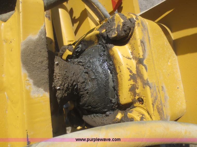 image for item F6836 1999 Caterpillar 120H articulated motor grader