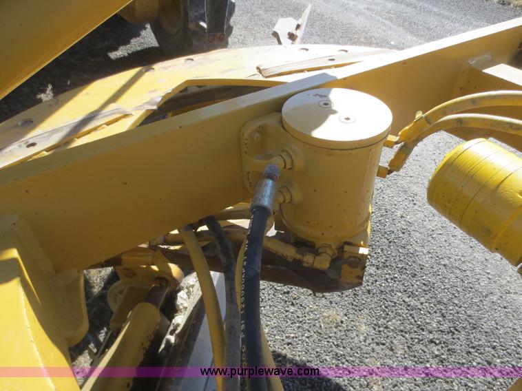 image for item F6836 1999 Caterpillar 120H articulated motor grader