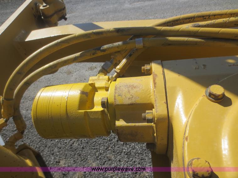 image for item F6836 1999 Caterpillar 120H articulated motor grader