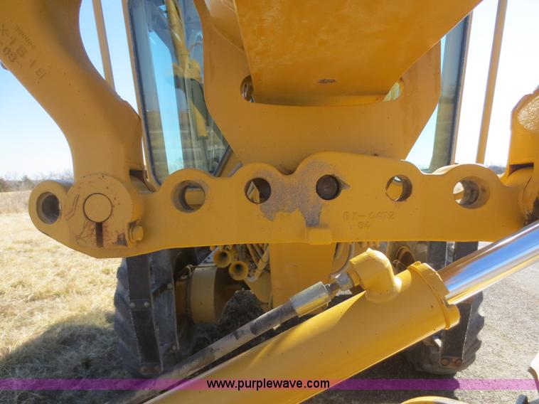 image for item F6836 1999 Caterpillar 120H articulated motor grader